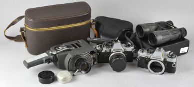 Assorted cameras, including an Olympus, OM10, in case,