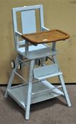 A blue painted metamorphic child's high chair