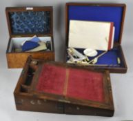 Three wooden boxes, an artists box, a mahogany writing slope and another,