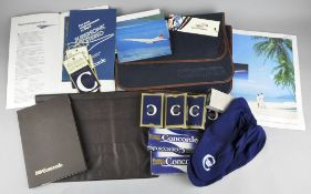 A collection of Concorde memorabilia, including travel games, playing cards,