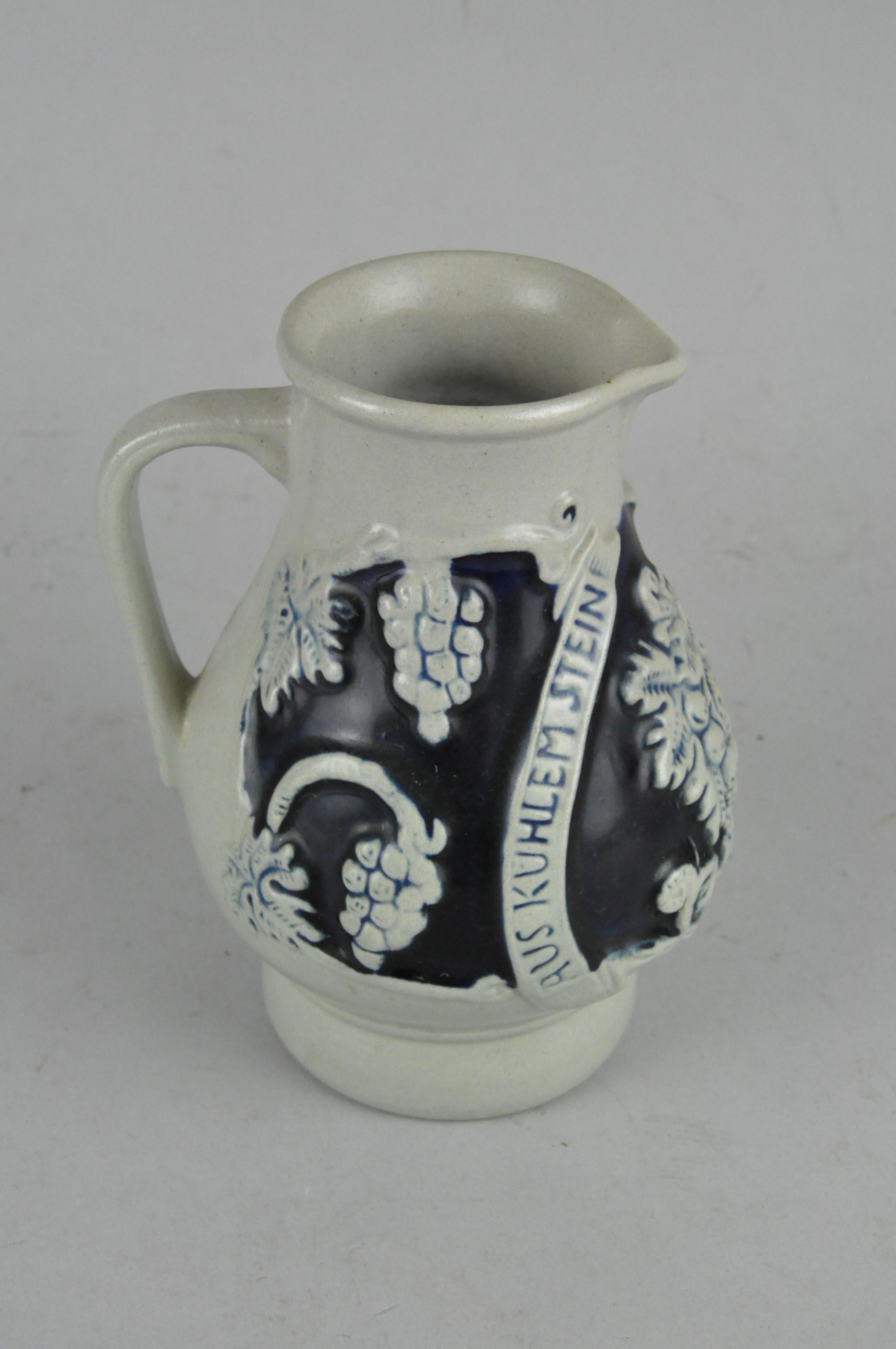 A mid-century Art pottery jug, a German jug, another jug and a wooden tankard - Image 15 of 17