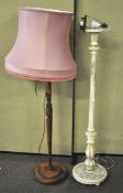 Two standard lamps, one painted,