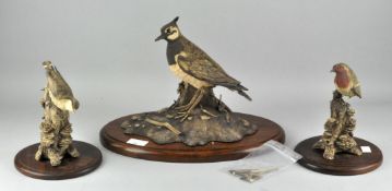 Three Linda Heaton Harris certificated earthenware figures of birds : Robin, Nuthatch and Lapwing,