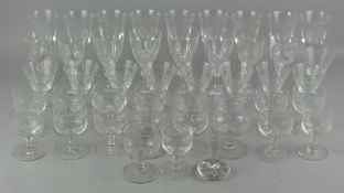 A collection of goblets and other cut glass ware