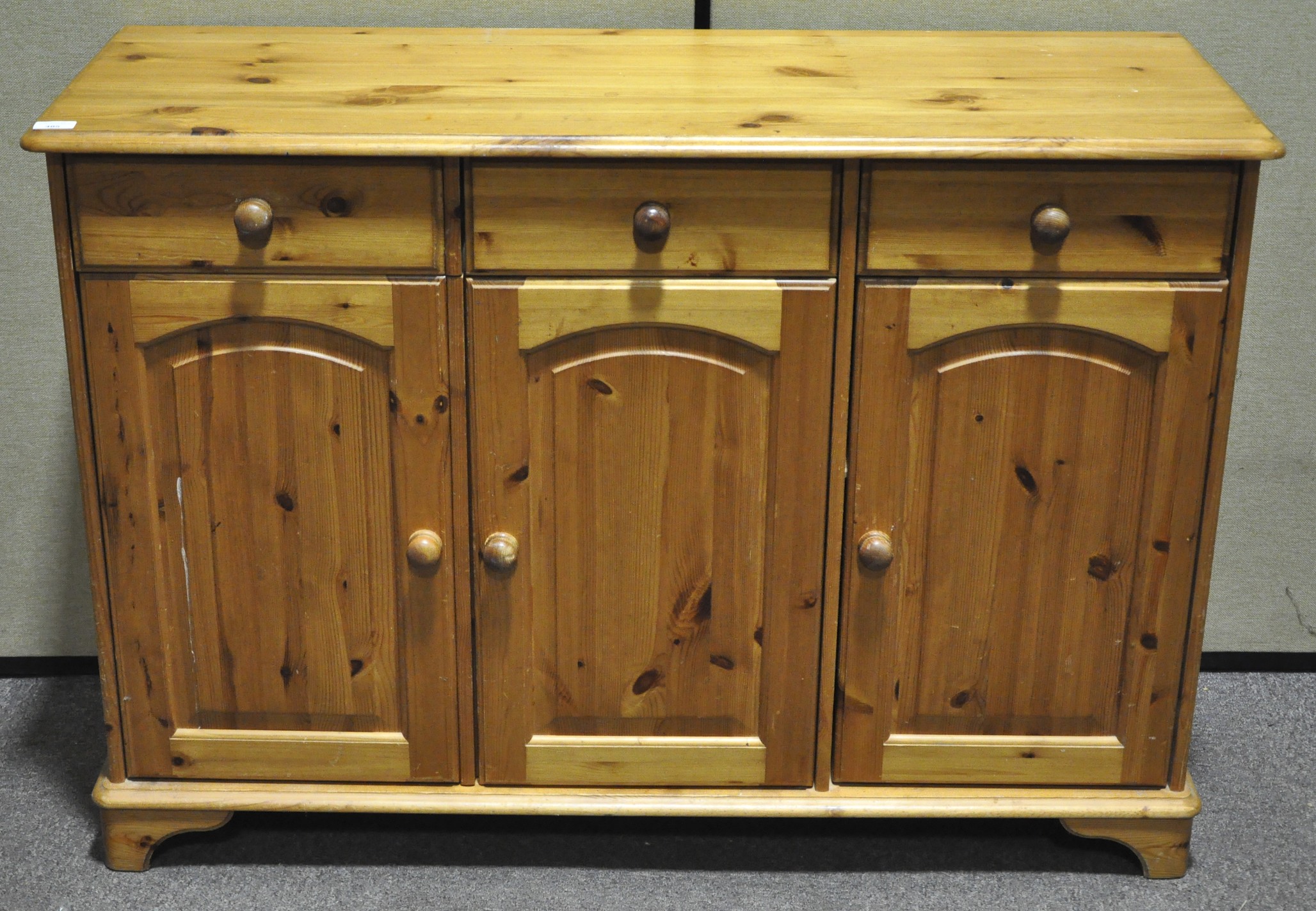 A 20th century pine sideboard,