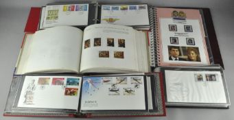 A collection of assorted stamps and first day covers in numerous albums,