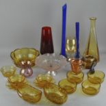 A large assortment of 1960's cut moulded coloured glass,