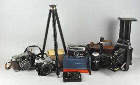 A quantity of cameras, including a Fujica 35-EE camera,