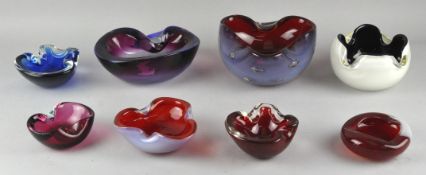 A collection of Murano cased glass trinket dishes of varying sizes and colour,