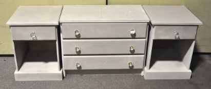 A painted pine chest of three long drawers with crystal knobs,