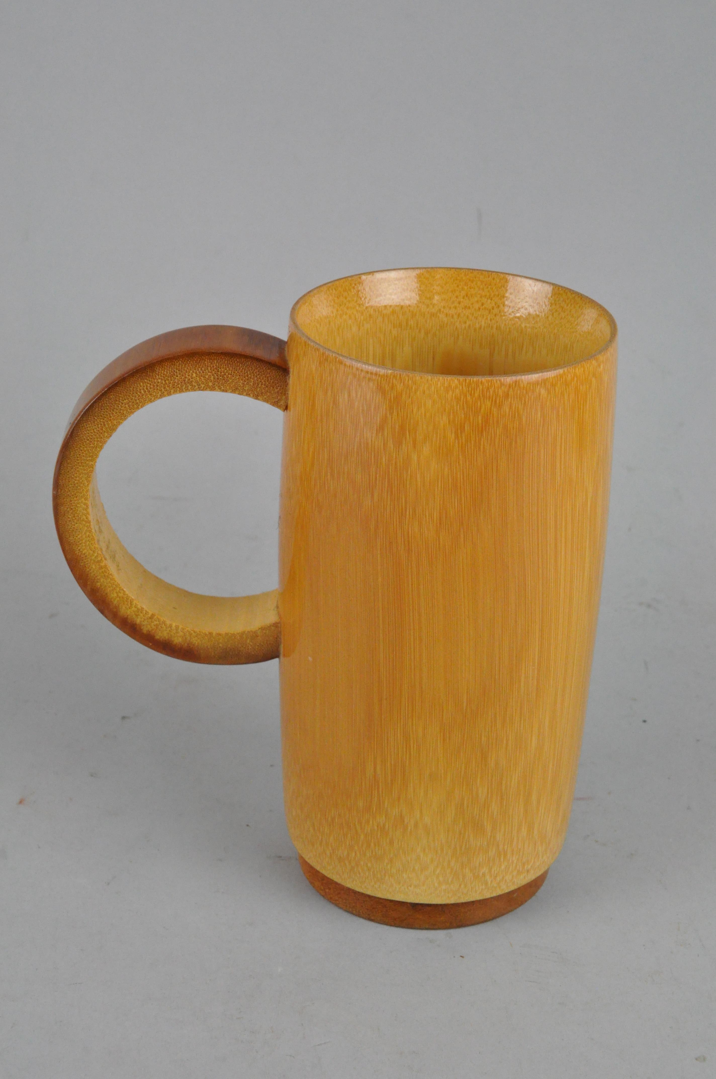 A mid-century Art pottery jug, a German jug, another jug and a wooden tankard - Image 11 of 17