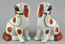 A pair of Staffordshire Spaniel dogs,