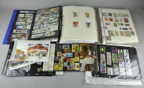 A collection of stamps, most in albums, including Hong Kong,