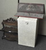 Two Green Man panels together with a three tier wall shelf and a Lloyd Loom laundry basket