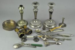 A collection of assorted silver plate, including a pair of candlesticks,