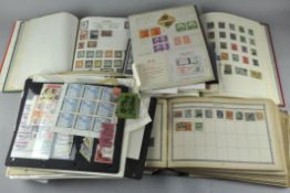 A collection of assorted stamps and first day covers in numerous albums,
