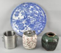 A Chinese blue and white charger along with a Chinese green glazed ginger jar ( lacking lid),