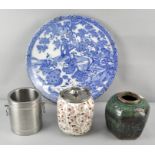 A Chinese blue and white charger along with a Chinese green glazed ginger jar ( lacking lid),