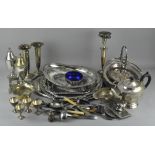 Assorted silver plated items, including candle sticks, sugar castor,