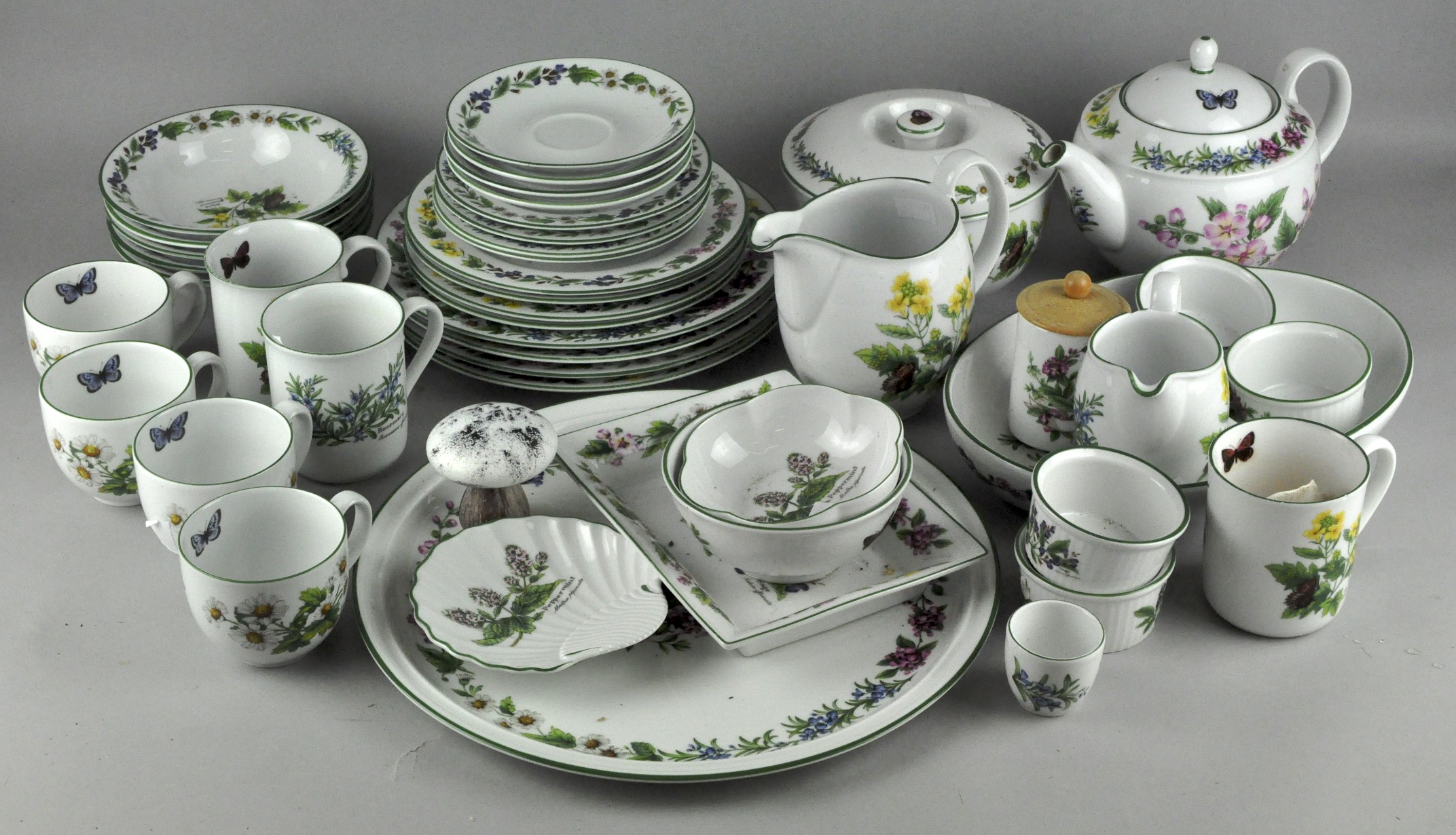 A collection of Royal Worcester 'Herb' pattern tea and dinner ware,