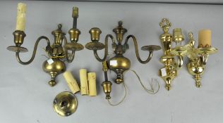 Two pairs of 19th century style brass wall sconces; one pair of single, the other twin sconced