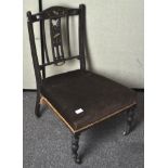 A mahogany side chair, inlaid with musical theme,