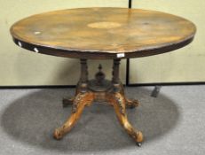 A Victorian oval, walnut and inlaid tilt top loo table,