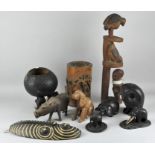 A collection of carved wooden items, including Chinese bamboo brush pot, ebony elephant figure,