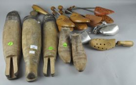 A collection of wooden shoe trees,