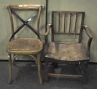 A vintage elbow chair and another chair,