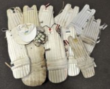 A parcel of cricket pads and gloves