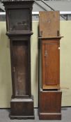 Two oak long case clock cases,