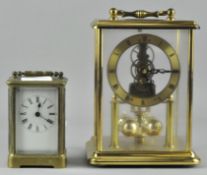 An H Samuel brass cased Anniversary clock, 21cm high,