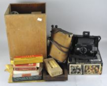 A collection of assorted camera equipment, to include Polaroid EE 100,