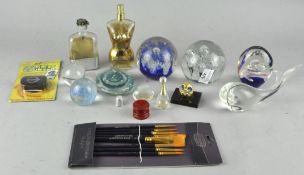 A collection of glass paperweights, together with other glass items,