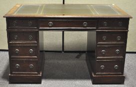 A mahogany pedestal desk