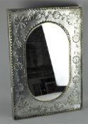 A silver coloured metal framed Mexican wall mirror of rectangular form,