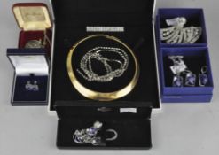 A group of assorted costume jewellery, including Swarovski earrings and more,