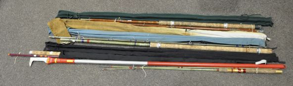 A collection of eight fly fishing rods, to include two Shakespeare,