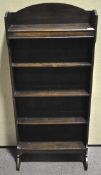 An oak standing bookcase,
