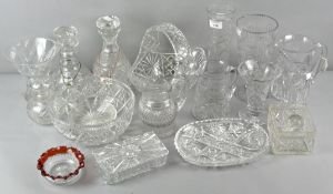 A large collection of cut glass and crystal to include decanters, celery wine glass and other items,