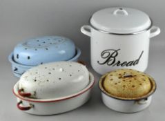 A selection of enamelled kitchen ware to include a bread crock and roasting dishes