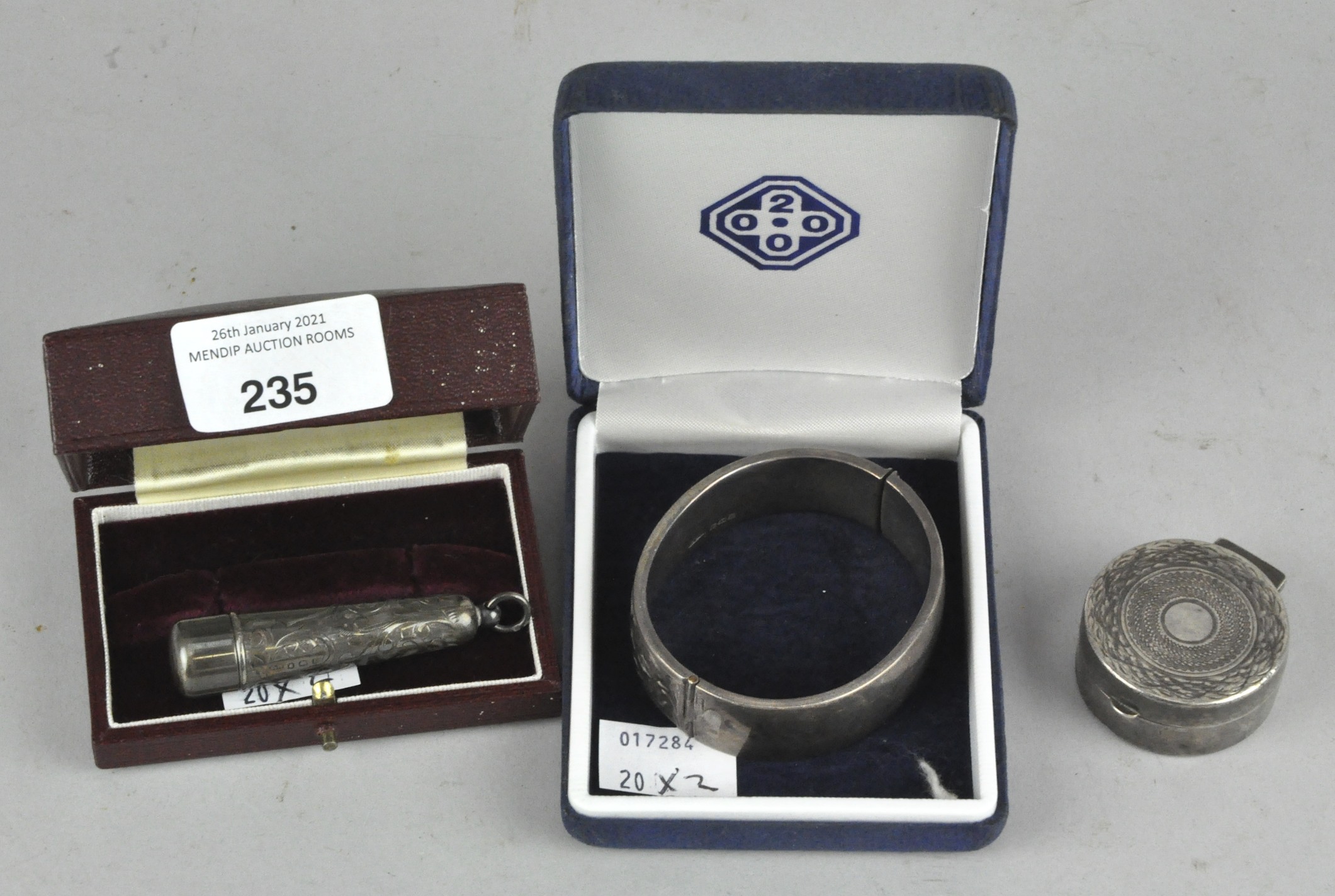 A George V silver cheroot holder with matching silver mounted cheroot,
