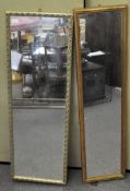 Two gilt framed hall mirrors of long rectangular form,