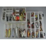 Three fishing tackle boxes with approximately 100 lures; spoons, spinners, replicants and plugs