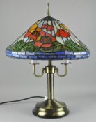 A contemporary 'Tiffany' style table lamp with stained glass shade,