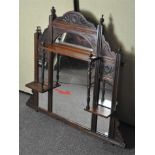 A Victorian over mantle mirror with engraved floral decoration,