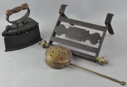 An iron trivet with stand,