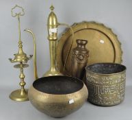 A selection of assorted brass ware, including a large hammered pot, tray and other items,