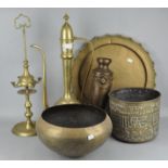 A selection of assorted brass ware, including a large hammered pot, tray and other items,